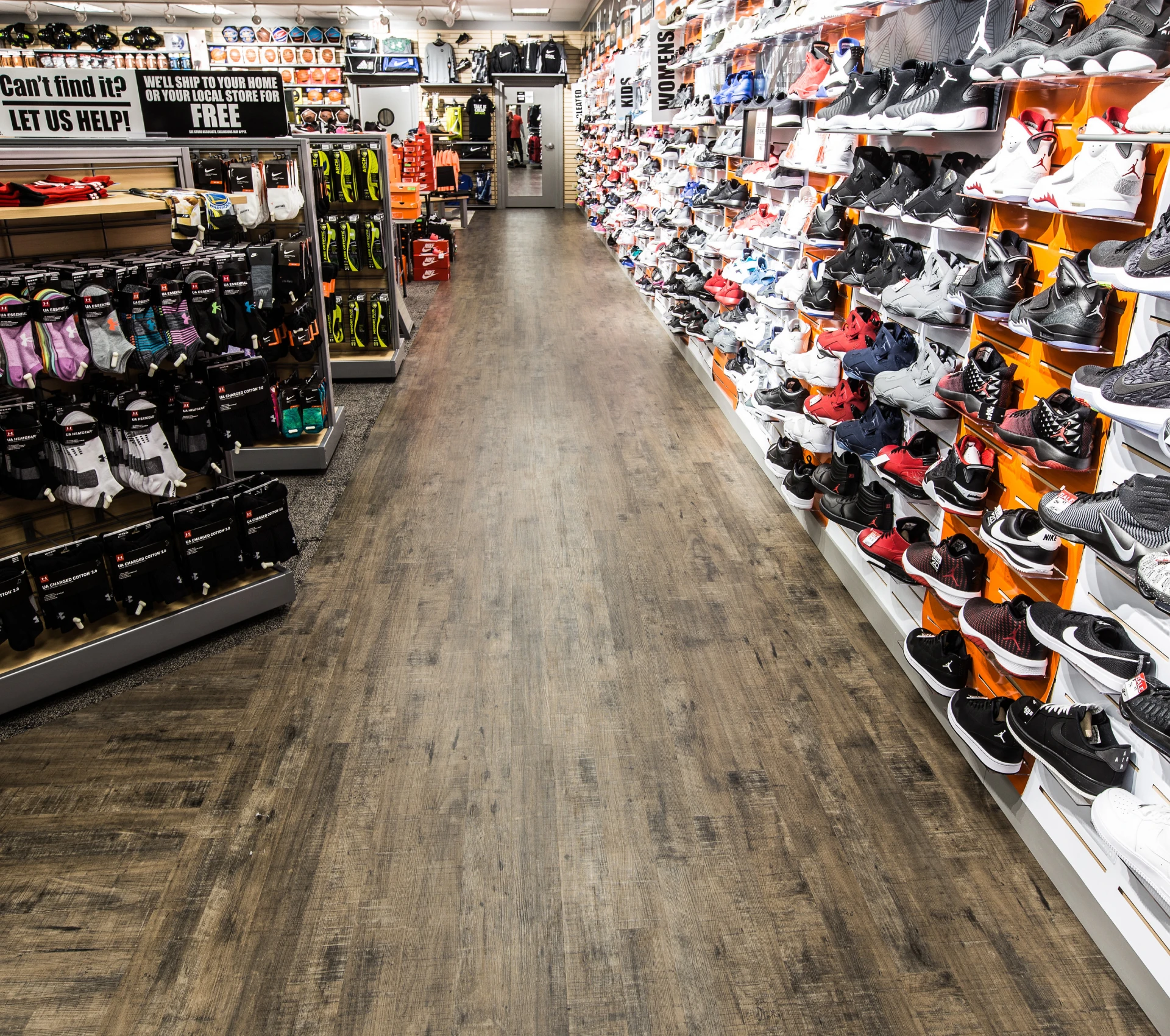 Wide selection of sneakers in shoe store